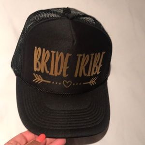 Black baseball cap with gold writing